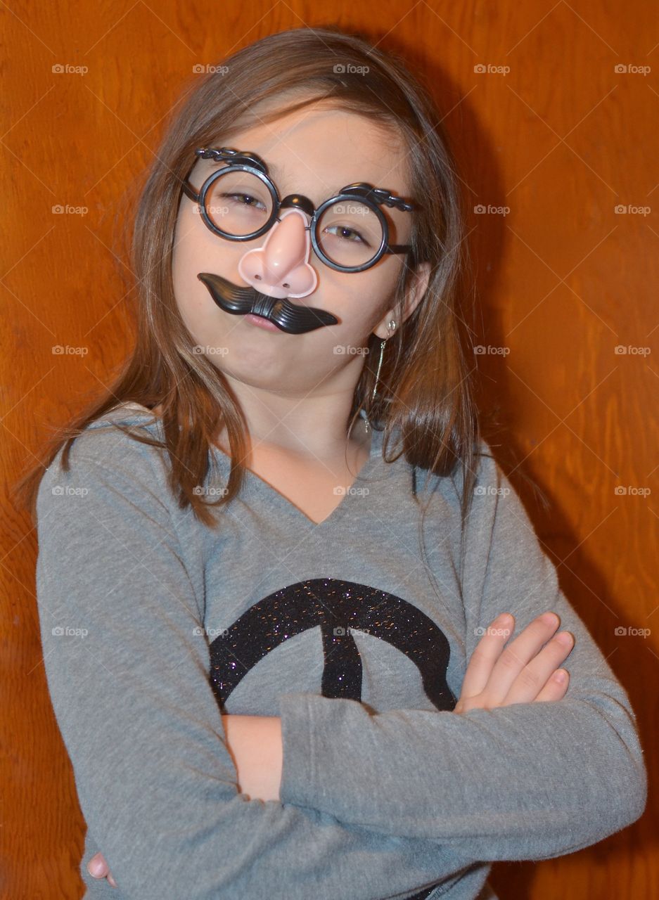 Portrait of a girl wearing funny eyewear