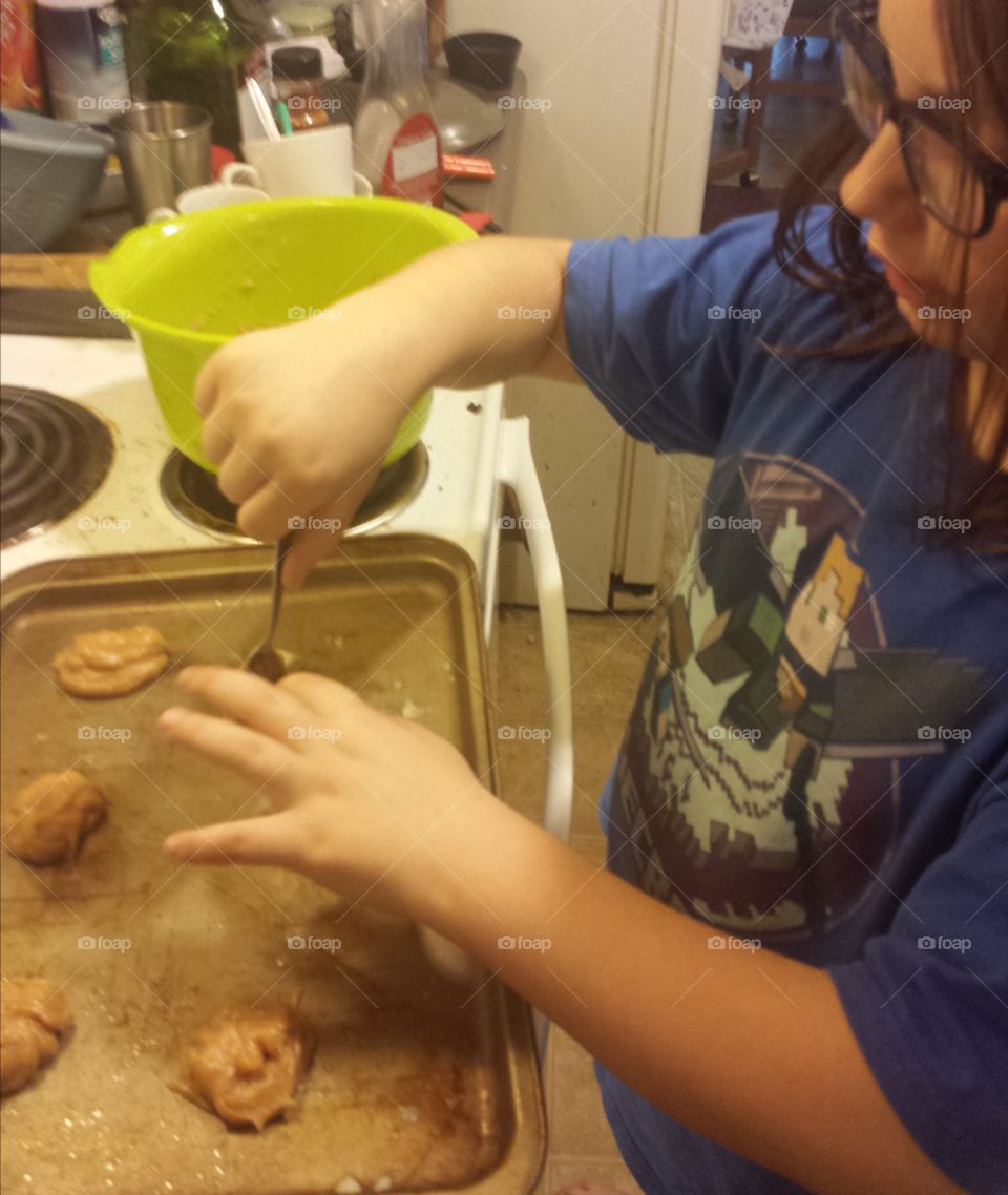 Close-up of a girl preparing cookies