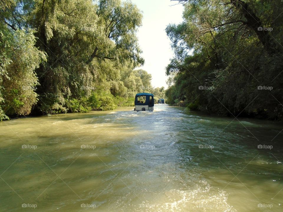 Boat sailing on lake