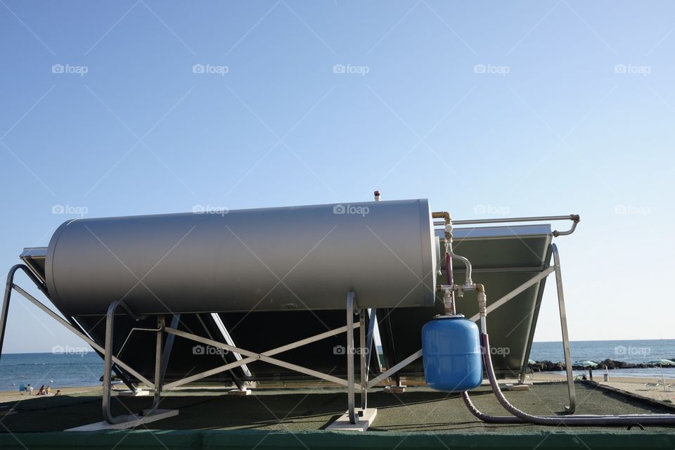 Solar panel with water tank