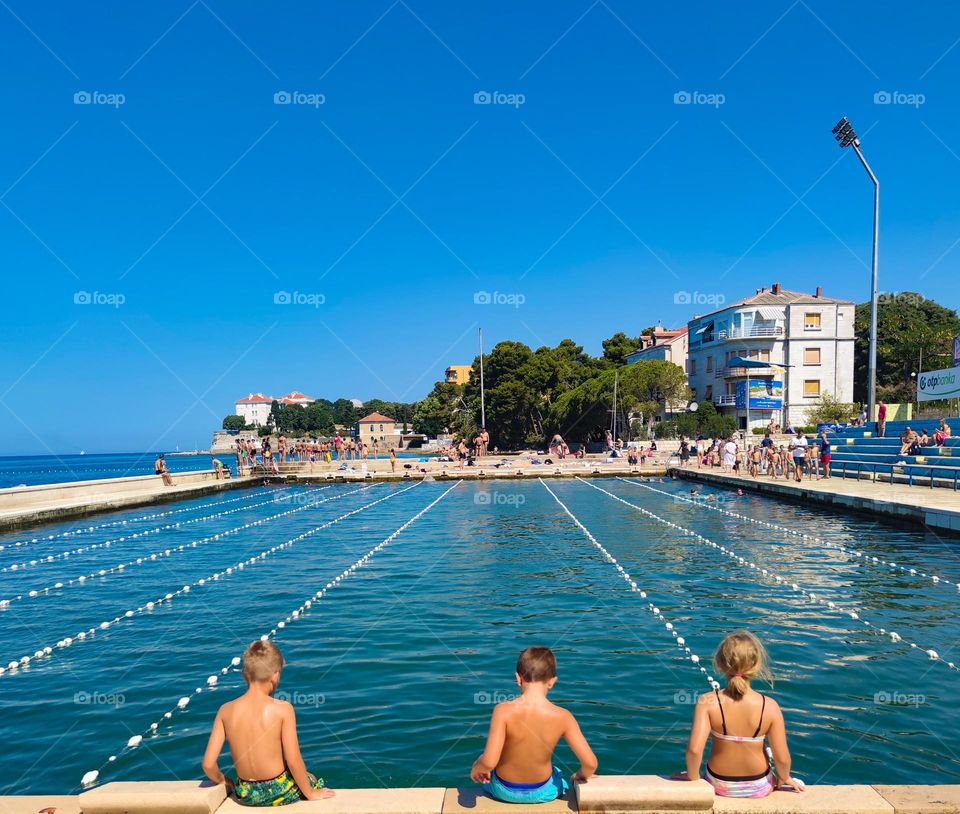 Summer swim preparation around a pool