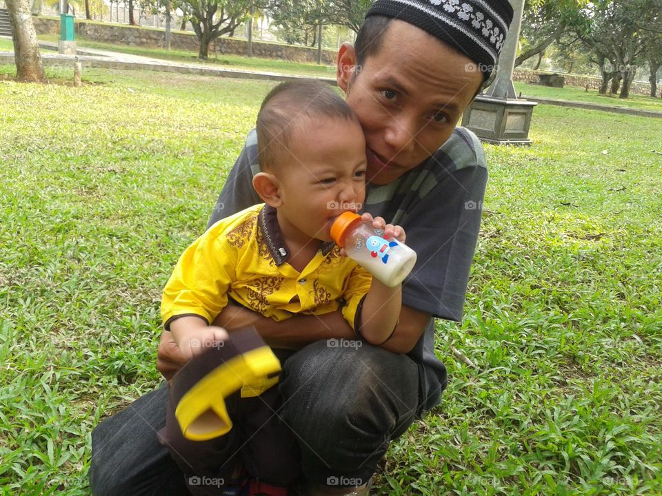 Father holding his son