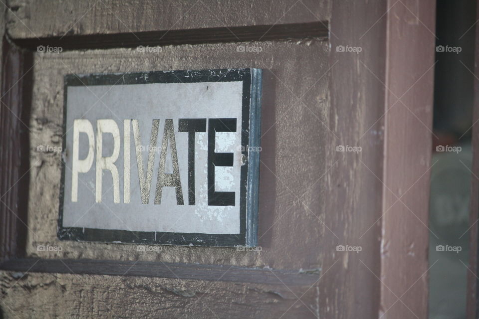 Private sign on a door