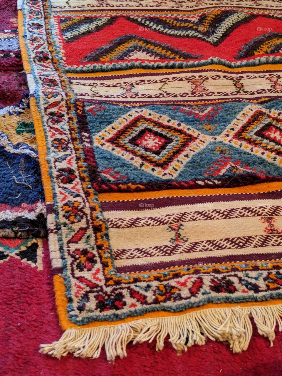 Handmade, Weaved, Bedouin (Tribal), Ornate Rug with Colorful Pattern and Fringe in Small Village in Morocco