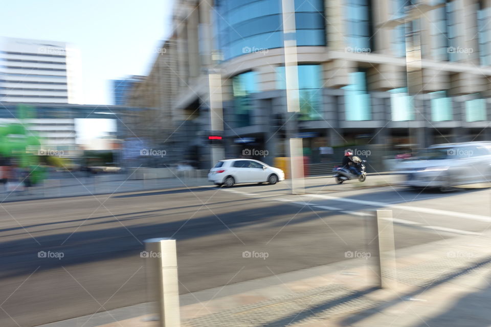 There are cars and bikes driven on the road.