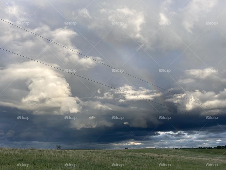 Thunder storm and rainbow