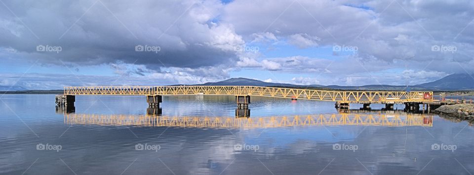 Reflection of bridge in water