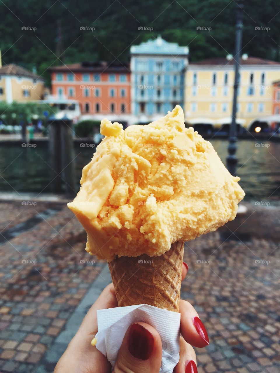 Women holding ice cream cone