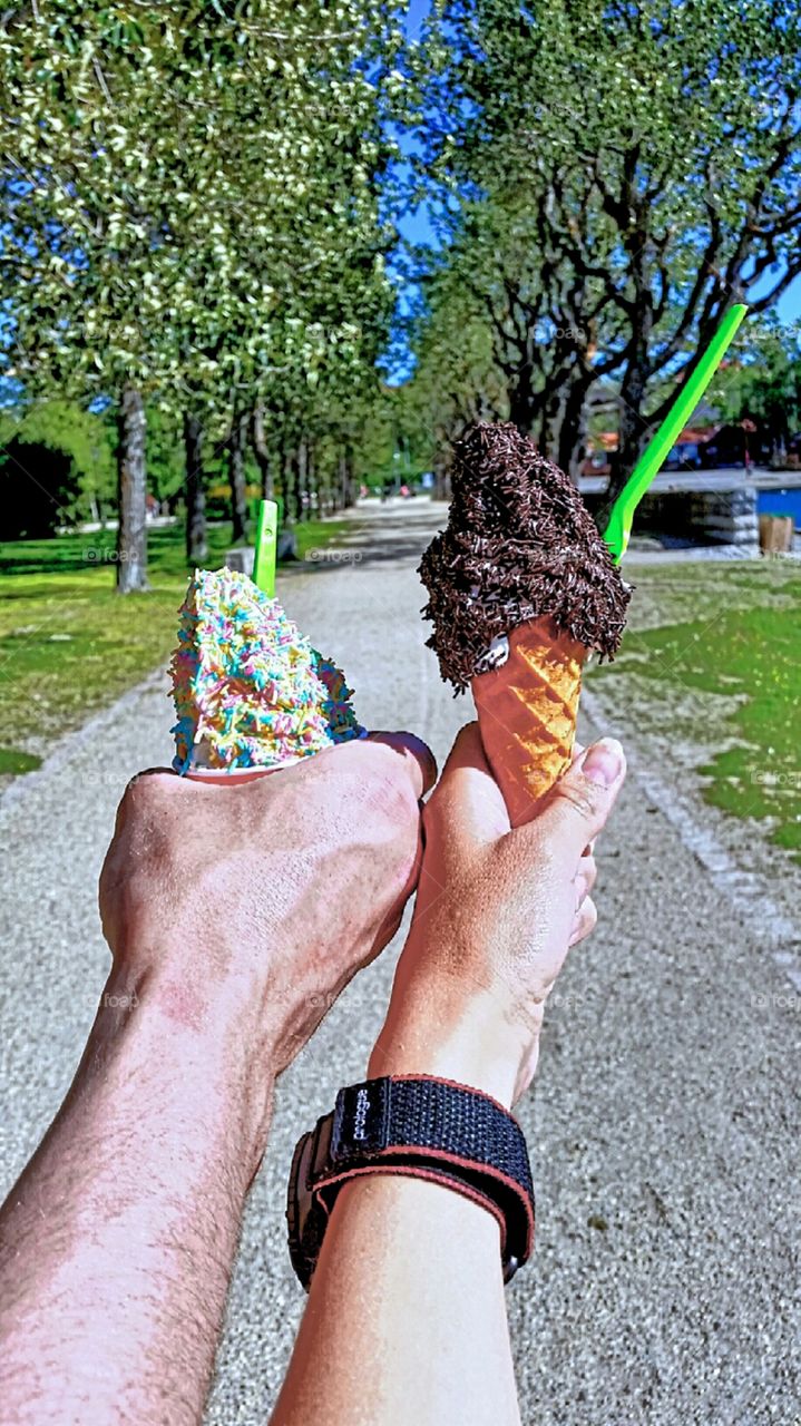 The best of summer!. Hands holding ice cream.