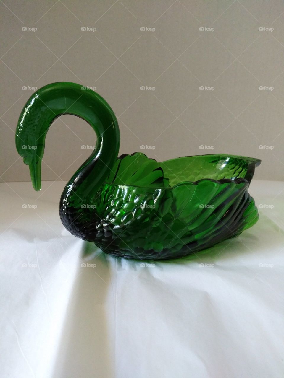 Green glass swan