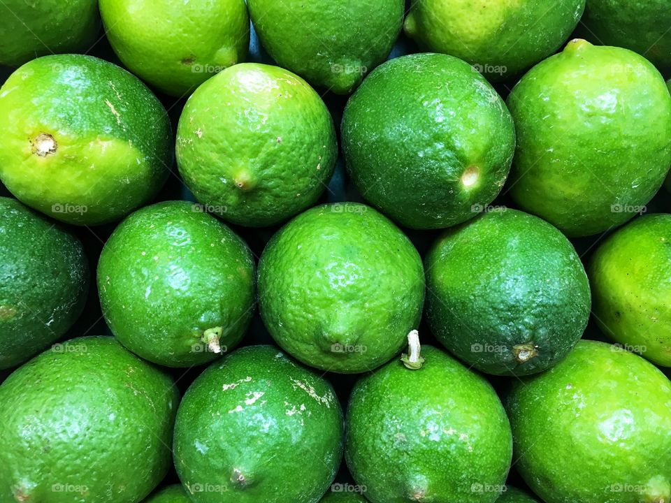 Limes Stacked up at the Market 