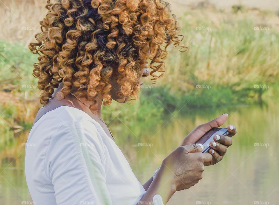A woman using a mobile phone