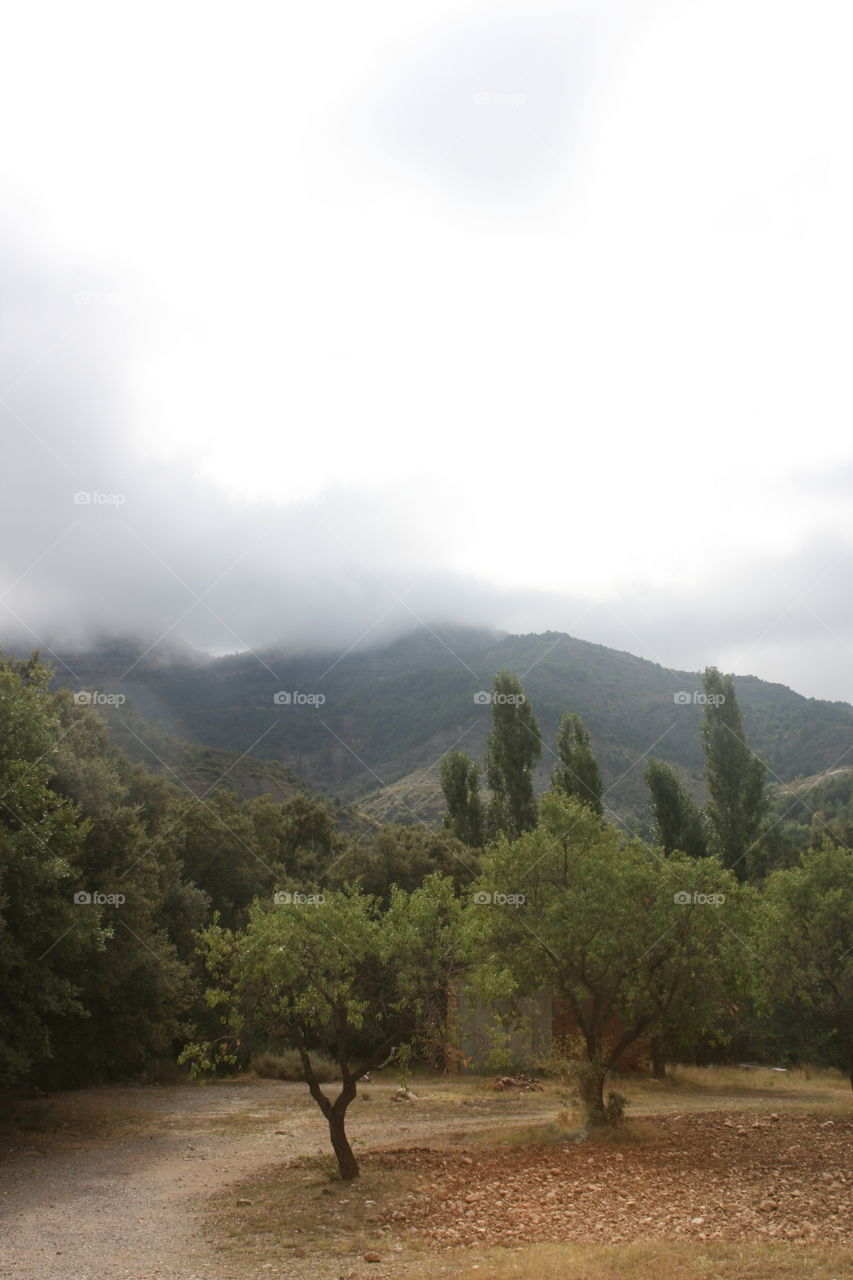 View of clouds on mountains