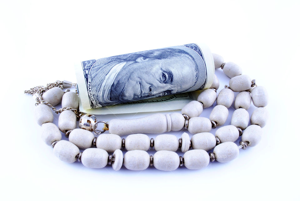 Close up currency of USA with Rosary
