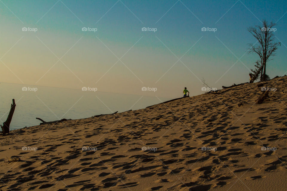 running down the sand dune. a fun run