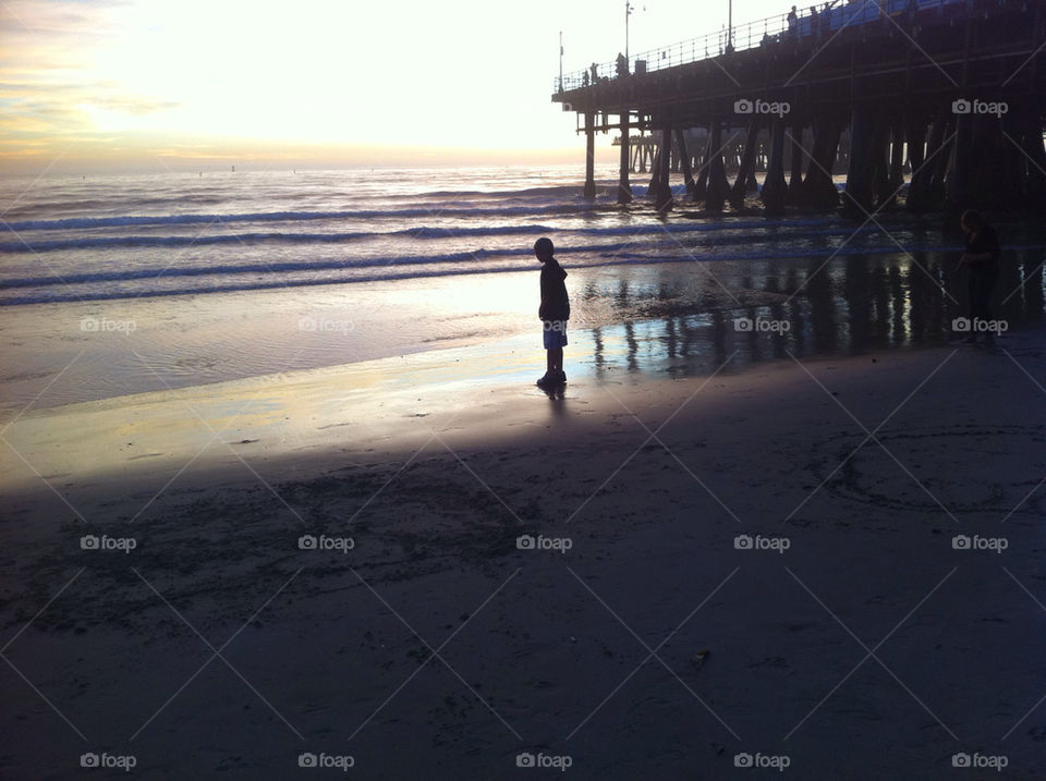 beach solitude by blueyedhoney. My son on Pacific Ocean beach for the first time. Sunset approaching. Venice Beach, CA