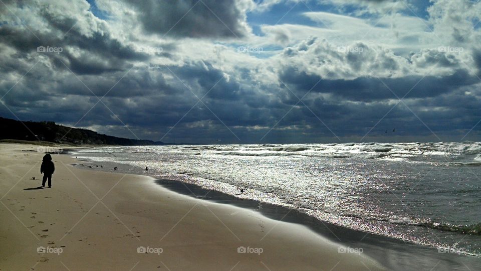 Walking the beach in solitude