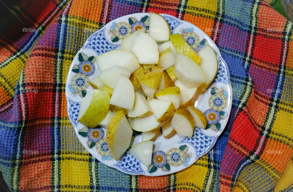 A pear on a plate,