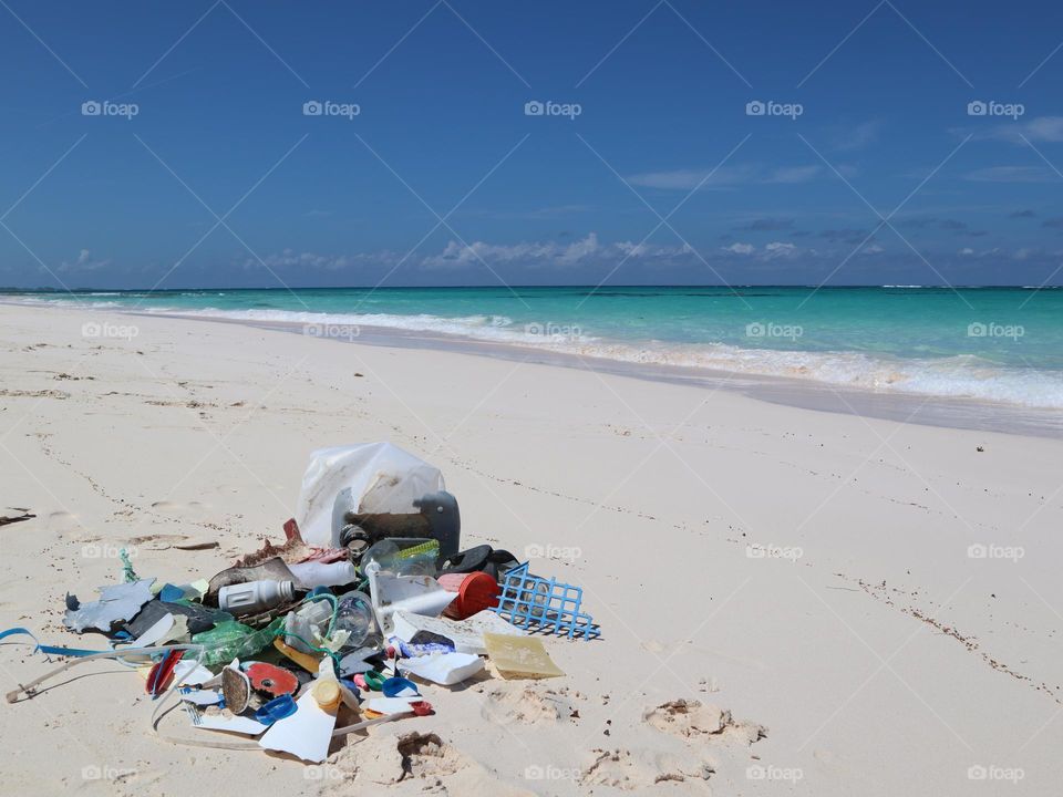 Picking up beach trash / plastic trash is everywhere 