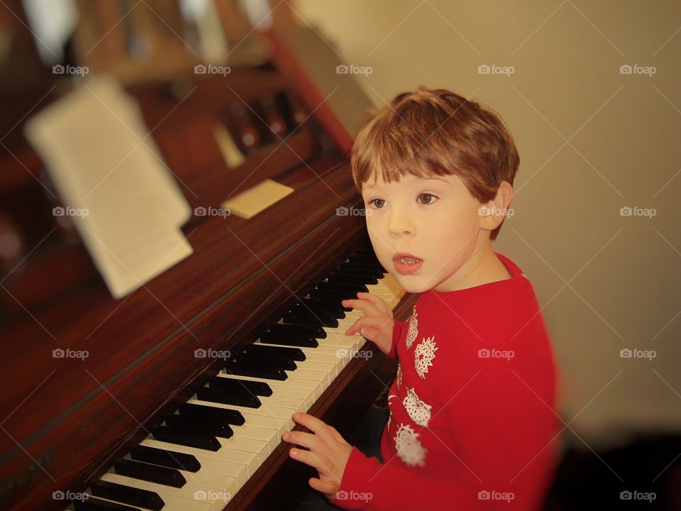 Boy Playing Piano
