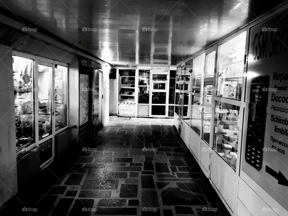 Emty city underground eith varriouse shops. Black and white image. Geometrical abstrat photo. Editorial use.
