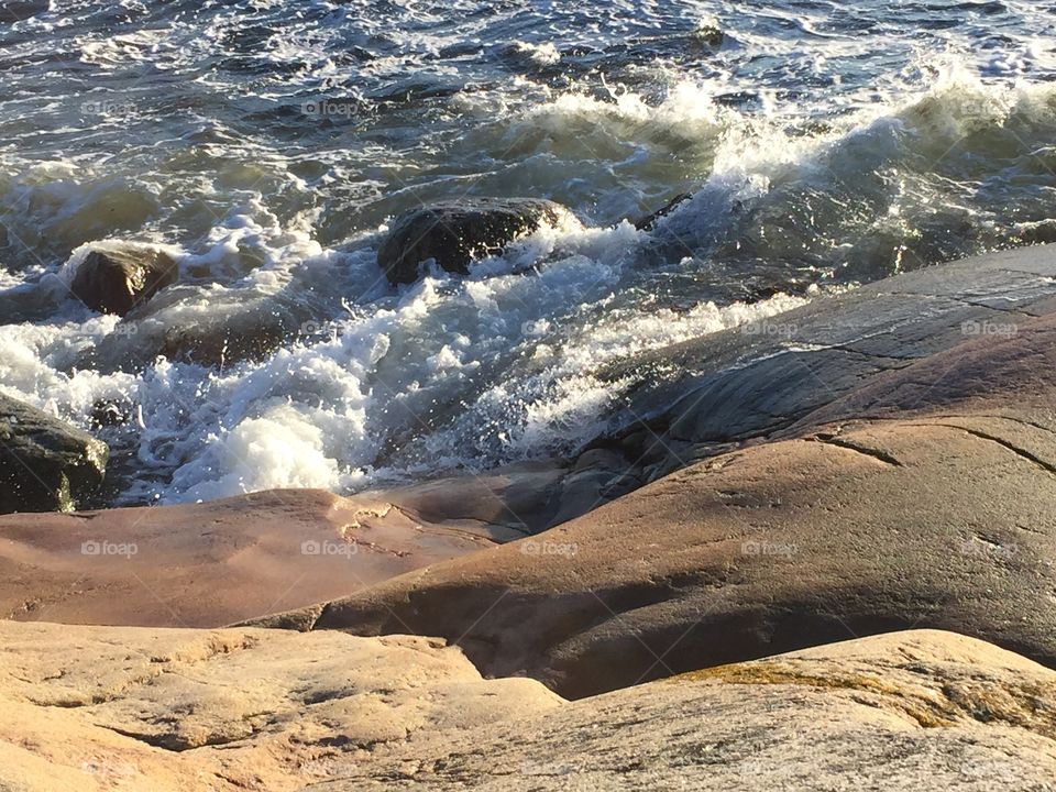 Noisy sea. Sea and rocks
