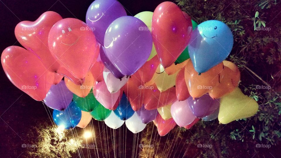 View of colorful balloons at night