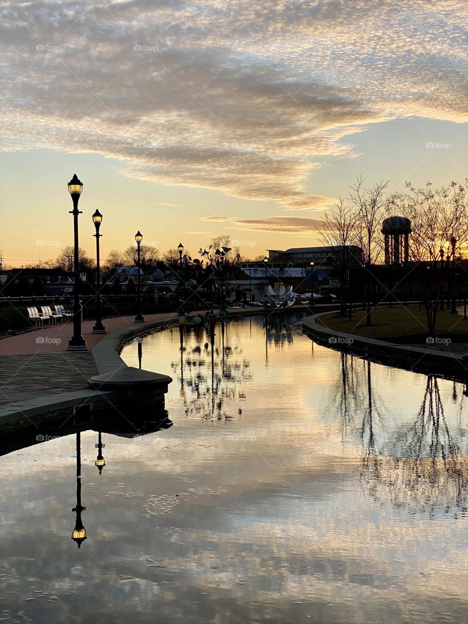 Reflections in a canal at sunset