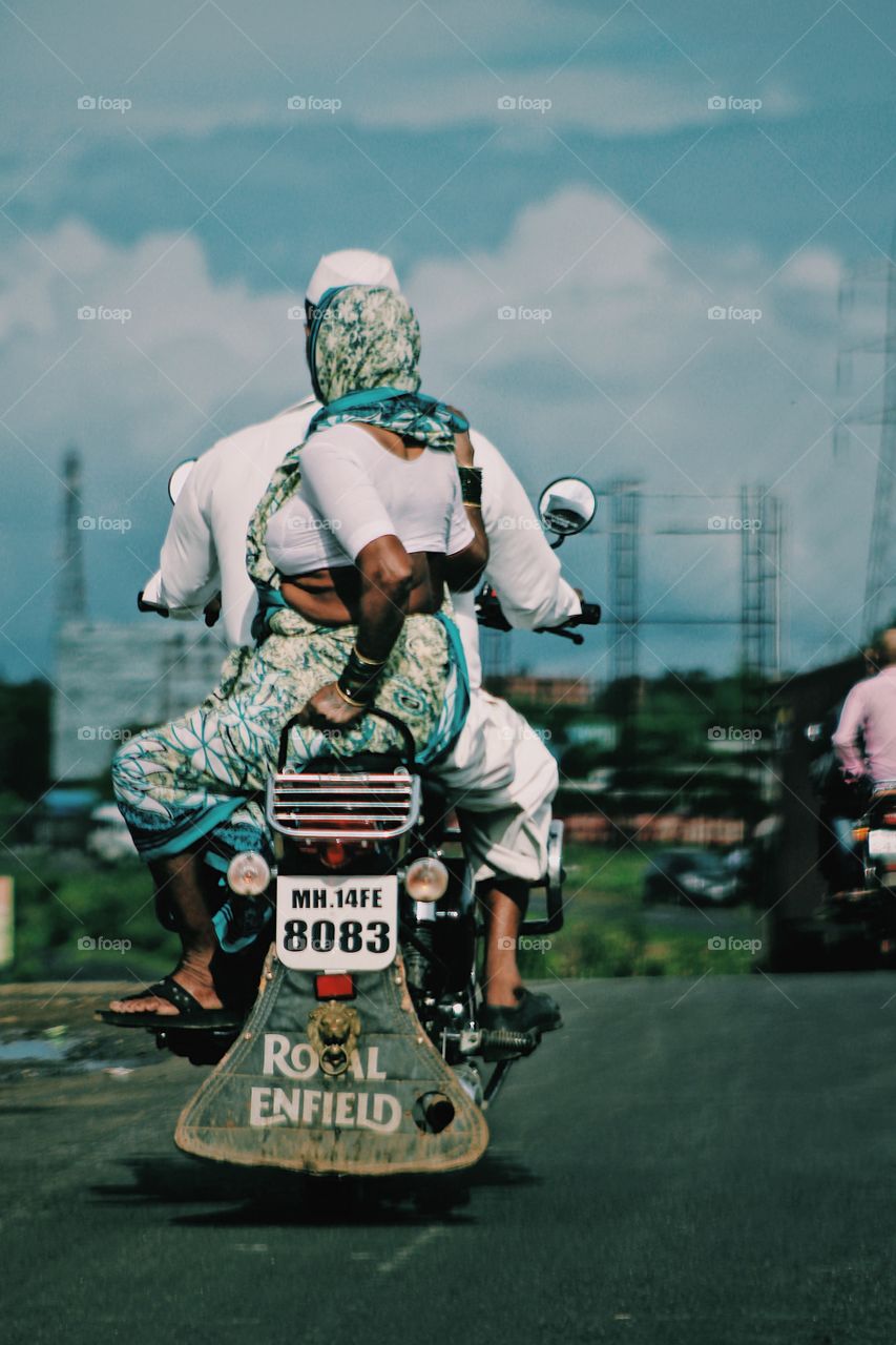 Old couple riding pride on bullet bike royal enfeild real india 