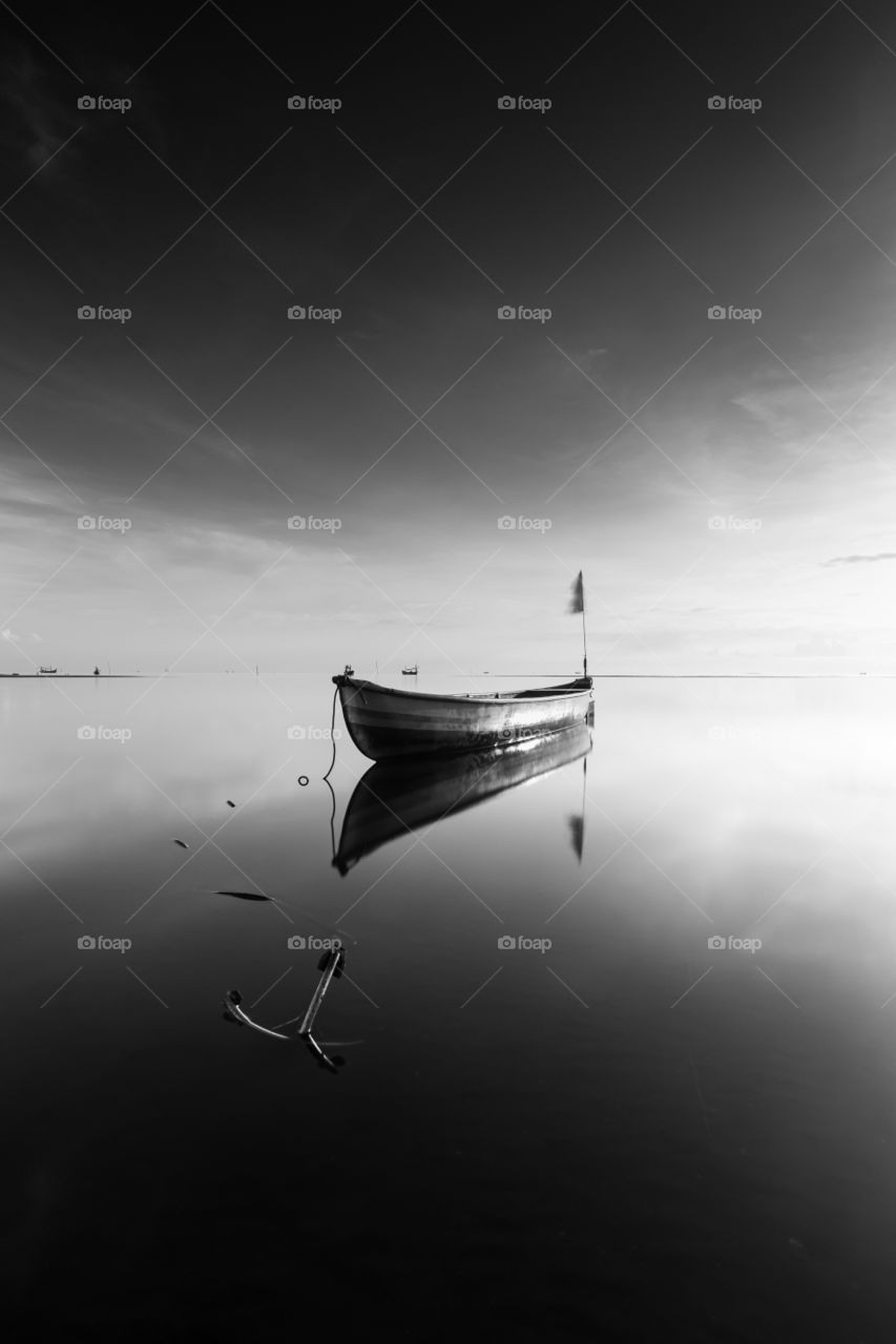 reflection a boat in beach
