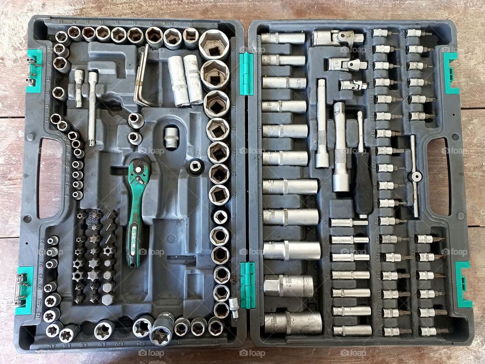 a set of repeating tools in a briefcase.