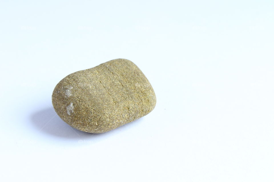 small stone on white