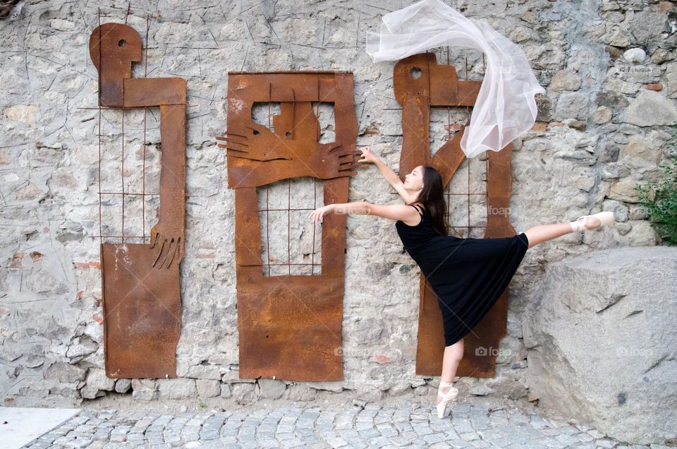 Young Female Ballerina Dancing with a Scarf Outside