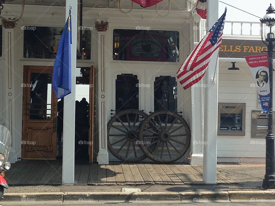 Wagon wheels in Old Wild West. Wagon wheels in front of bar in Virginia city, Nevada, old Wild West 