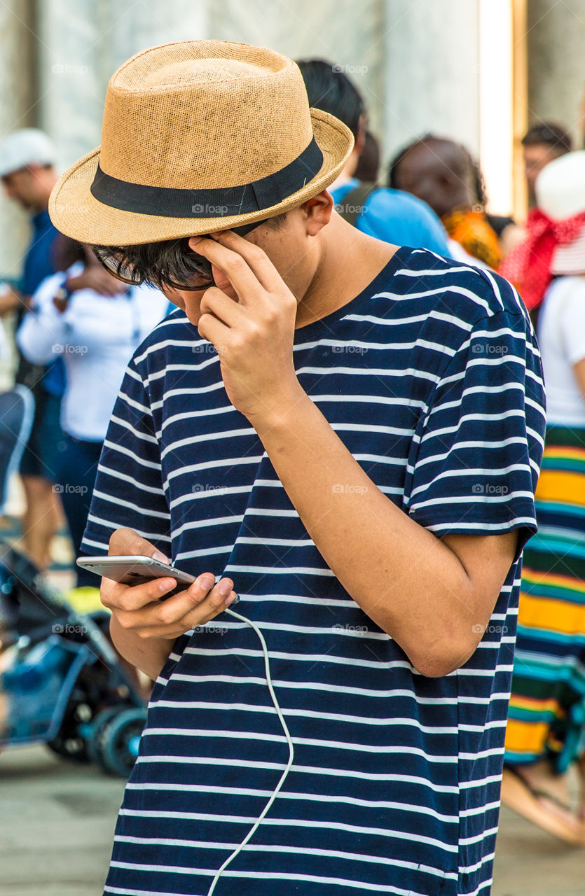 Teenager Boy Using Mobile Phone
