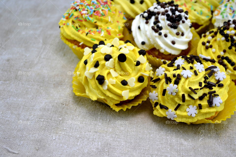 Elevated view of yellow cupcakes