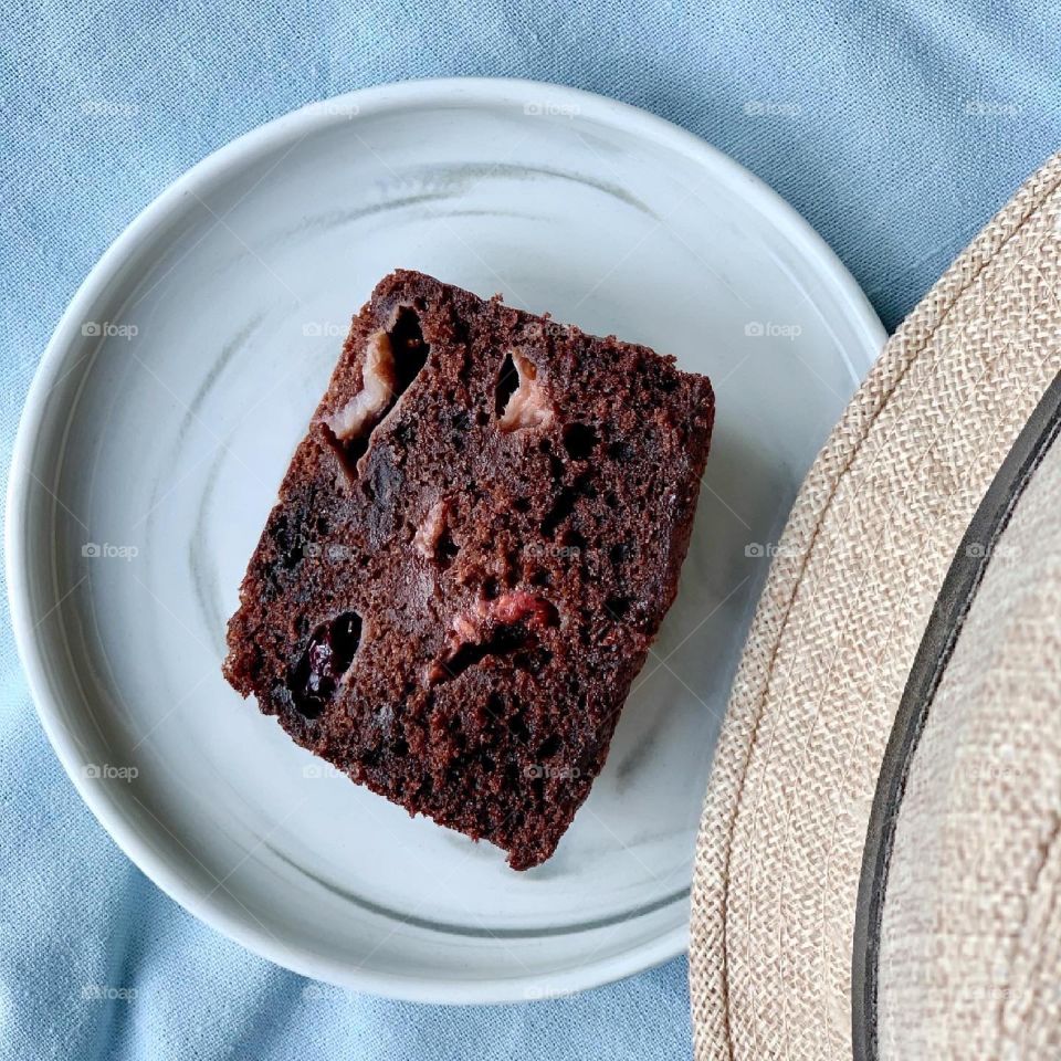 Chocolate loaf cake with berries sliced up