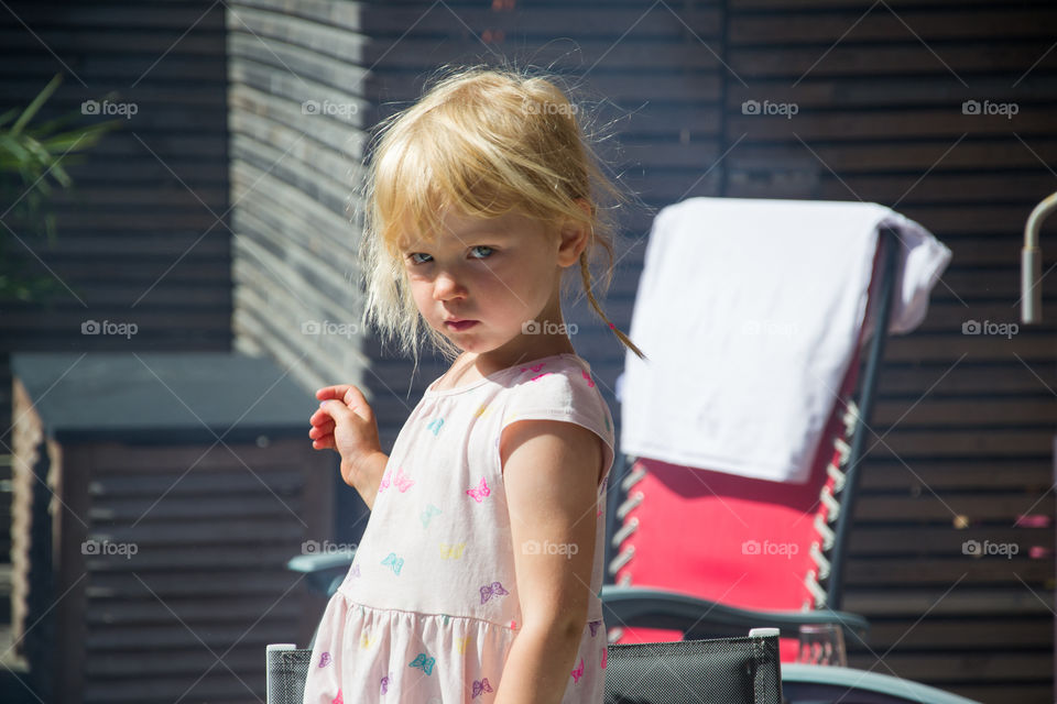 Angry child age of three at her home in Sweden.