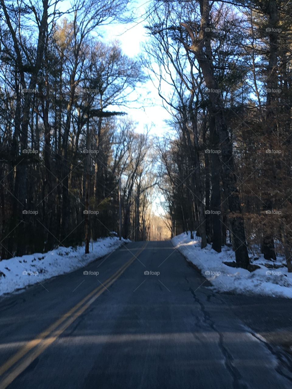 Light At The End Of The Road, New England

Late in the day driving home, it was getting dark, bit you could see the last of the sun shining up ahead of us!