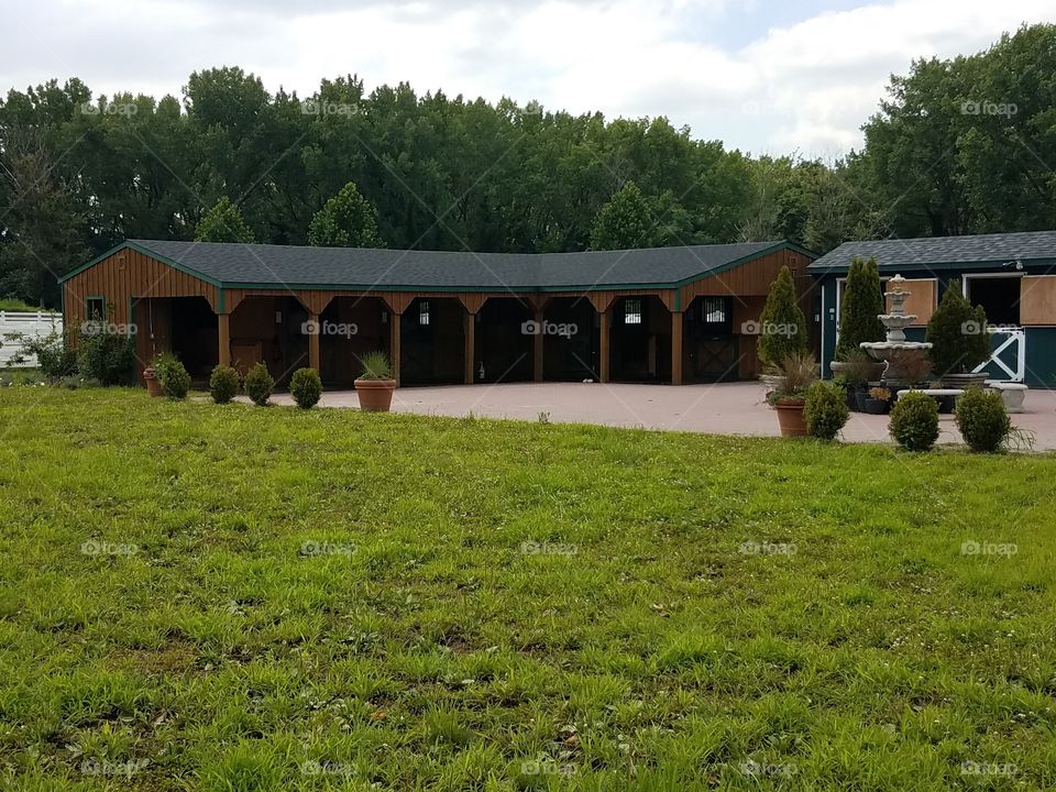 Outside stables at an equestrian farm.