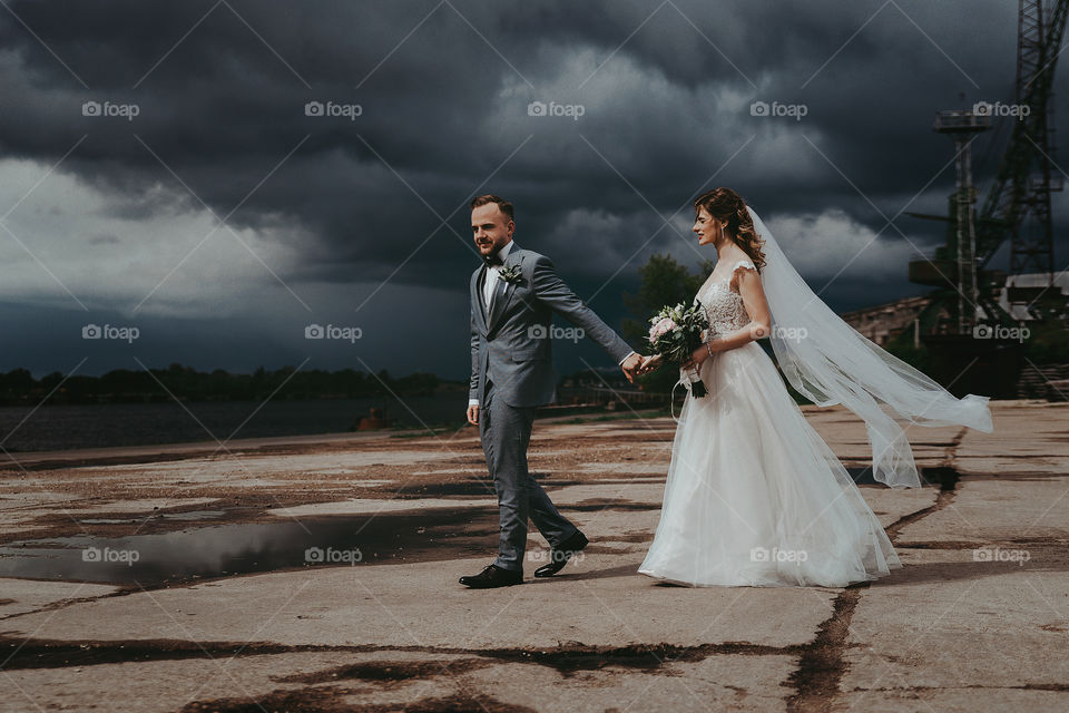 Love. Wedding day. Bride and groom. Cloudscape.