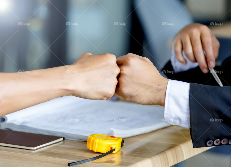 business fist bump