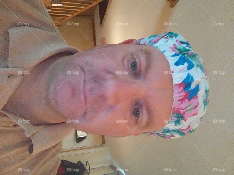 man with shower cap