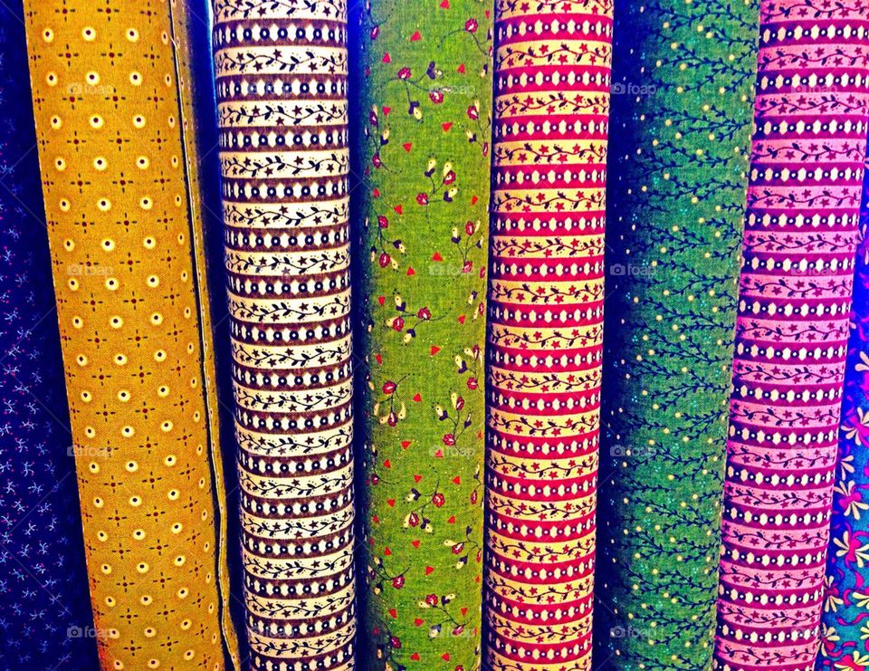 Bolts of vivid fabric