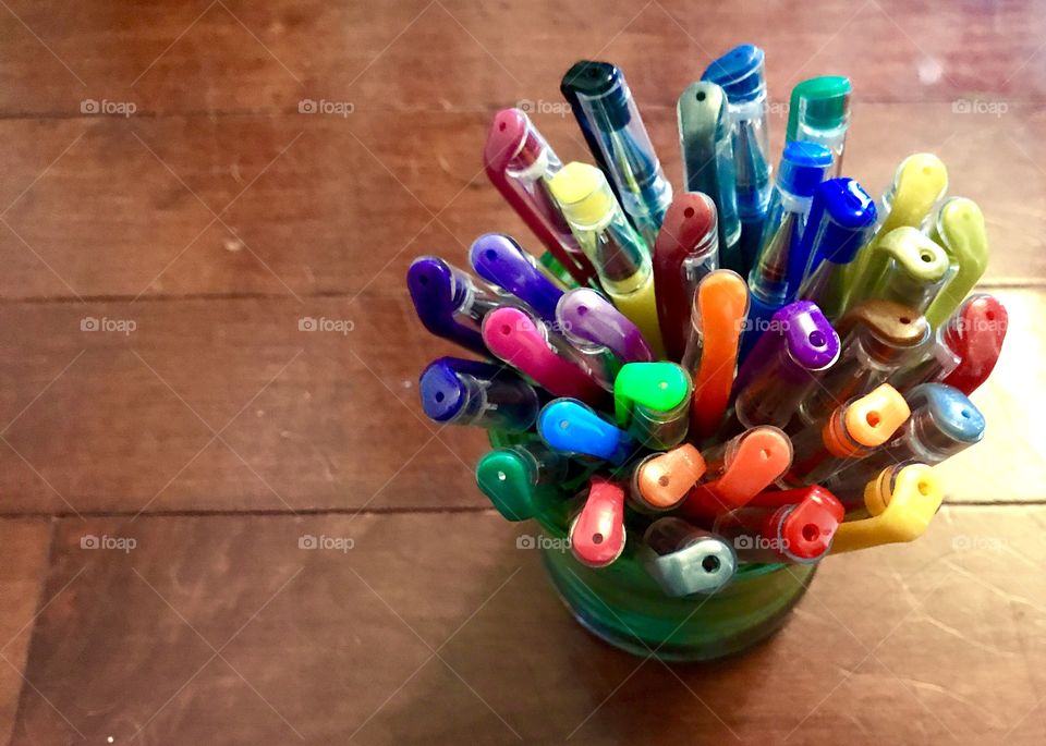 Colored Pens on Desk