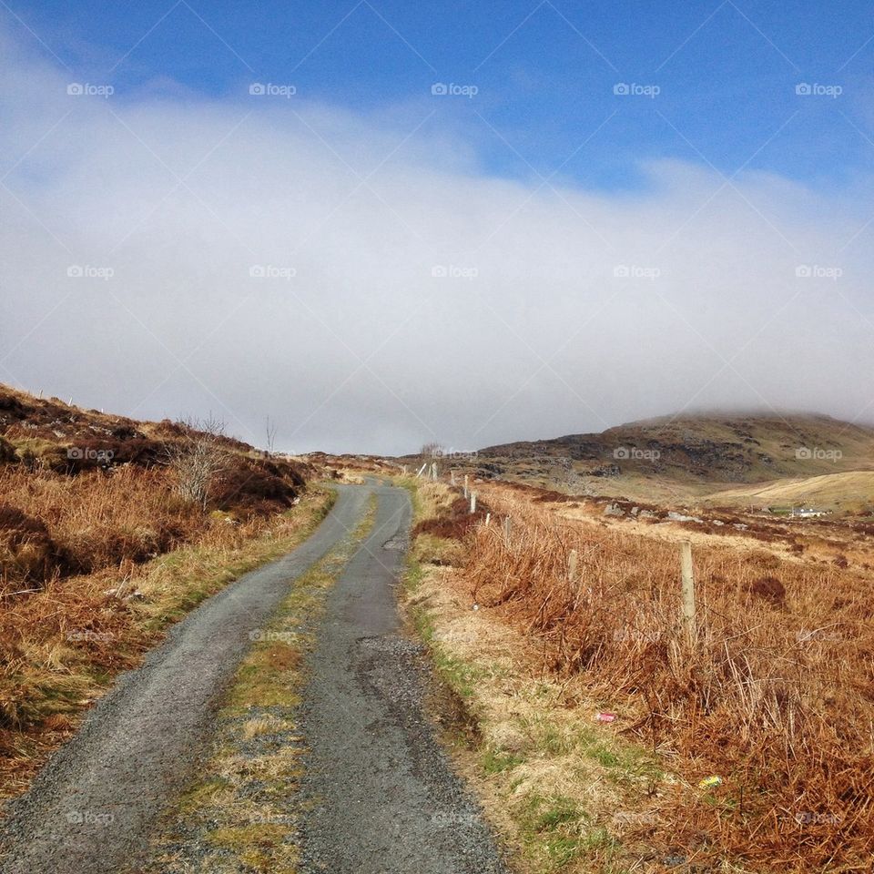 Road through hills in Ireland