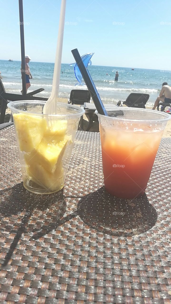 pic from vacation in bulgaria 2018 of a coctail and a plastic glas of pineapple
