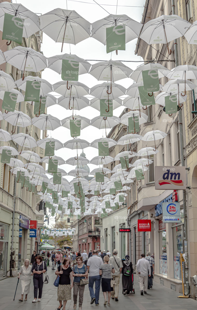 White umbrellas over Ferhadija Street