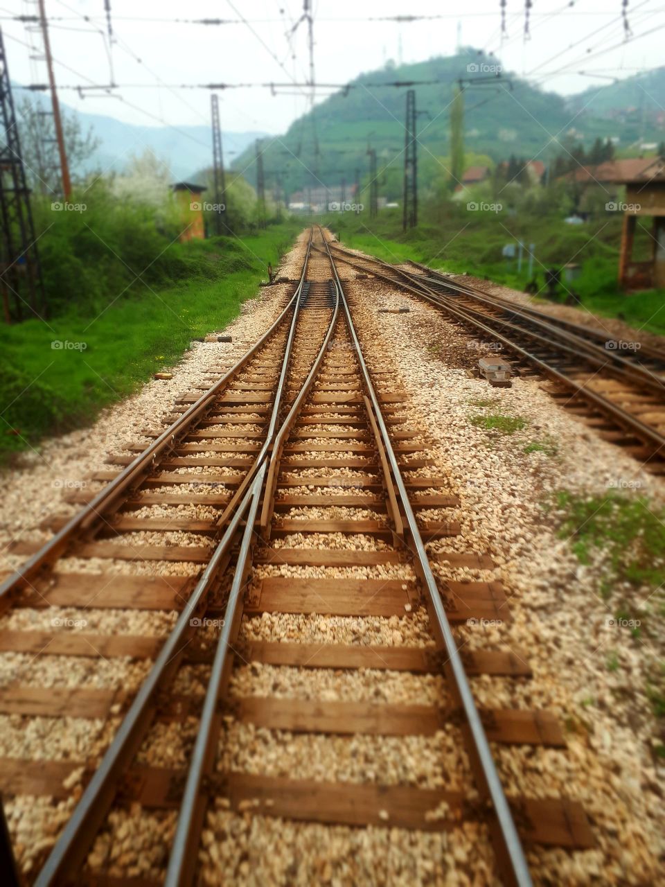 A view from the window of the last passenger wagon to the railroad and the place where the junctions are connected