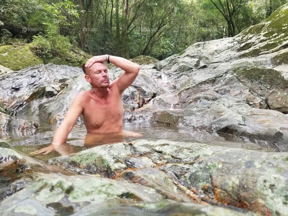 Bathing in a Natural Pool of Ice Cold River Water